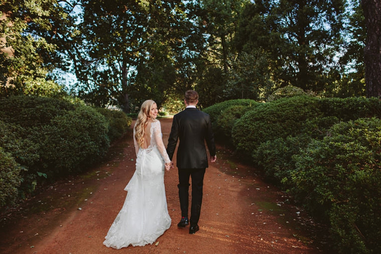 Elegant wedding portrait of the bride and groom at Bendooley Estate gardens