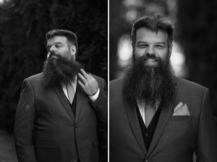 Black and white groom portrait infront of hedges at Milton Park.