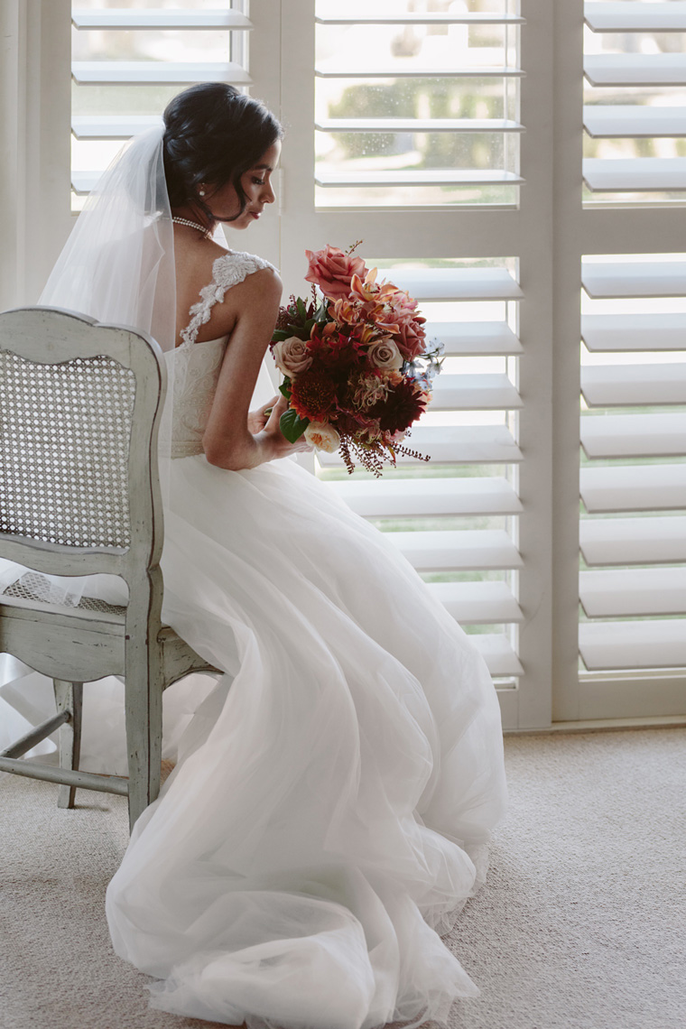 Full length bridal portrait, seated.