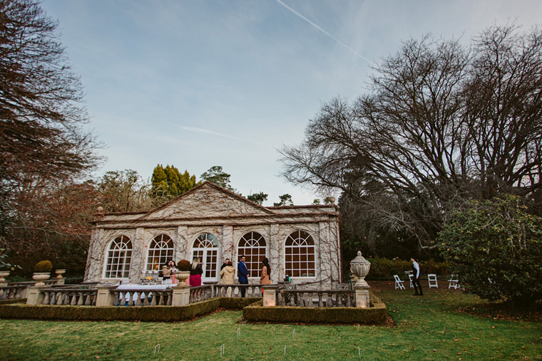 Guests gather for canapes in front of the Pool Room at Milton Park.