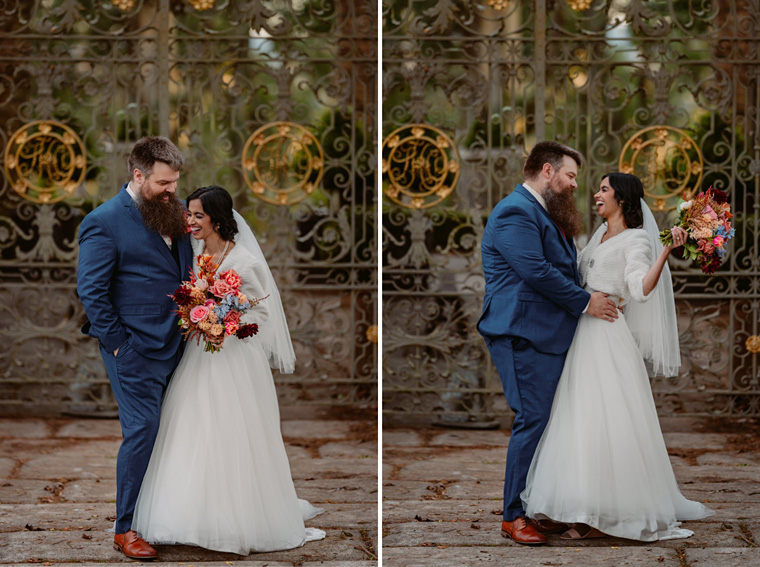 Bride and groom laugh infront of ornate iron gates at The Coach House, Milton Park.