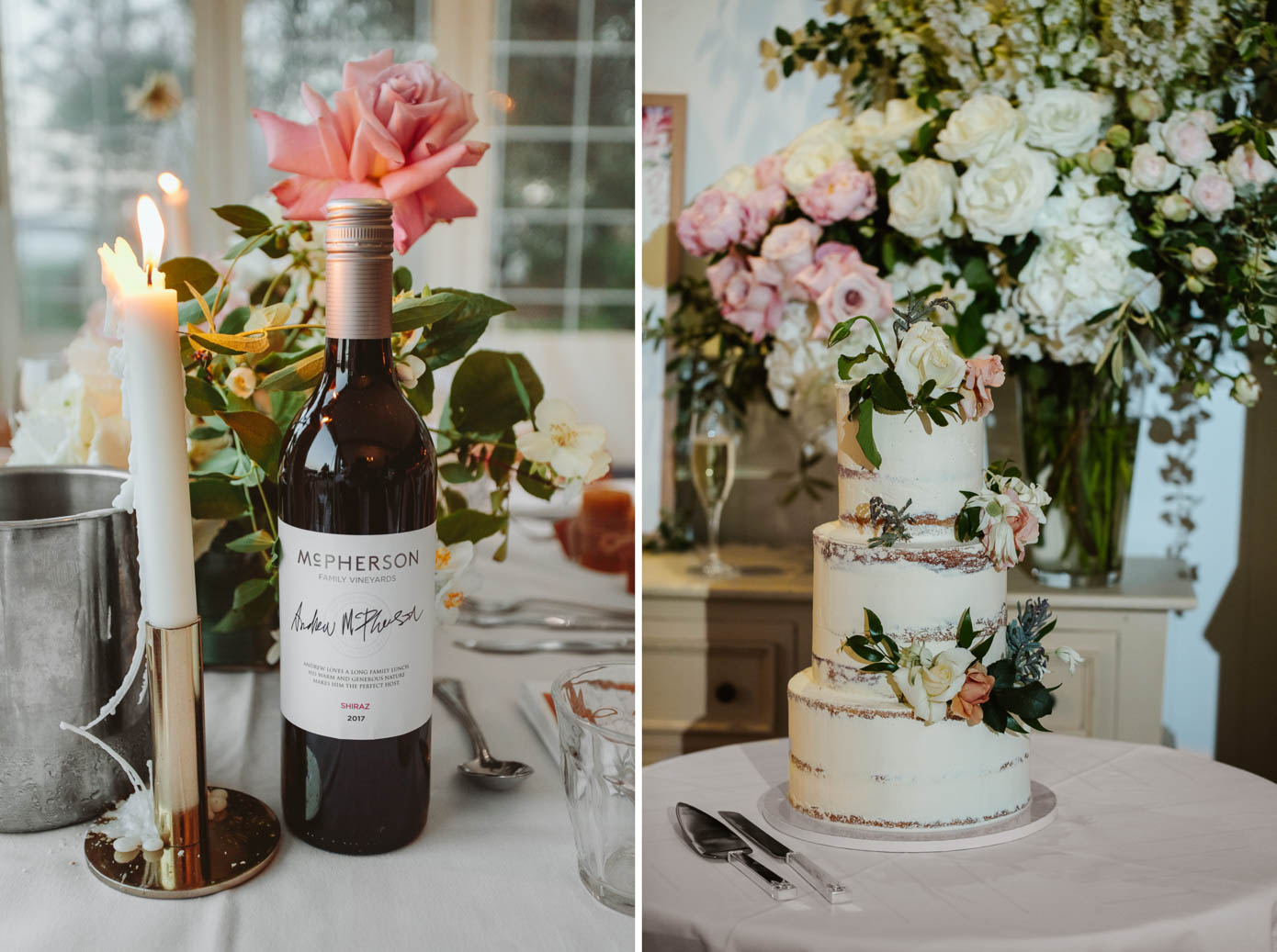 A bottle of wine sits beside an elegantly decorated wedding cake adorned with white flowers.